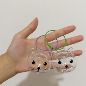 1 x Pet Hair Keychain in the Shape of a Cat's Face